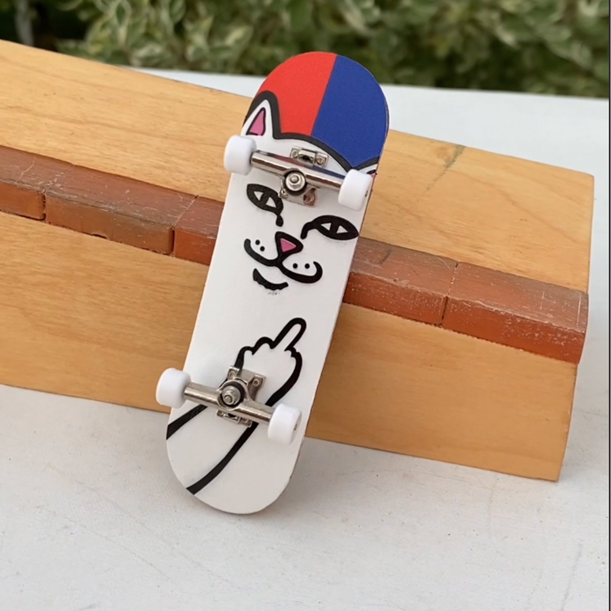 RIPNDIP Lord Nermal Mini Skateboard (Red/Blue)
